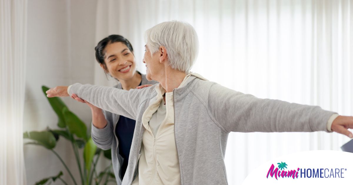 A caregiver and senior practice tai chi as one of many enriching activities for seniors at home.